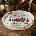 White tray with gold trim featuring Farm Fresh Christmas Trees sign with red truck and evergreens