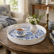 White tray with gold trim featuring blue and white porcelain floral and bird chinoiserie design