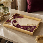 Qatar Flag Wind Glass Serving Tray – Falcon Skyline on a coffee table, featuring UV-printed artwork on tempered glass with an electroplated frame and matching handles.