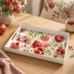 White tray with gold trim featuring watercolor pomegranate and pink floral botanical design
