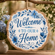 Welcome To Our Home MDF Wood Hanging Wall Decor – Blue Floral clear acrylic hanging wall decor with back-printed illustration, scalloped die-cut silhouette, hung with natural jute twine.