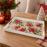 White tray with gold trim featuring red poinsettia holly and pine cone Christmas botanical pattern