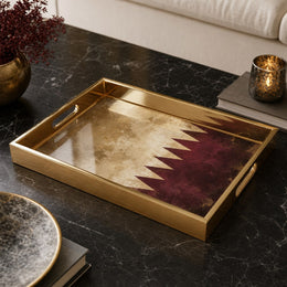 Qatar Flag Heritage Decorative Tray with Distressed Maroon Design | Minti Home on a coffee table, featuring UV-printed artwork on tempered glass with an electroplated frame and matching handles.