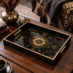Persian Mandala Decorative Tray with Black and Gold Frame | Minti Home on a coffee table, featuring UV-printed artwork on tempered glass with an electroplated frame and matching handles.