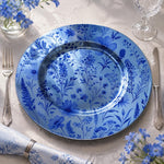 All-over blue wildflower meadow pattern of cosmos, lavender, and delphinium on a round blue decorative charger plate for garden brunch table decor.

Plate type: electroplated (blue)