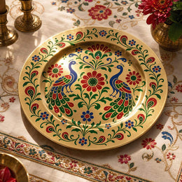 Decorative charger plate on a linen table.