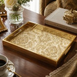 Vintage Gold Damask Arabesque Glass Serving Tray, 40x30cm on a coffee table, featuring UV-printed artwork on tempered glass with an electroplated frame and matching handles.