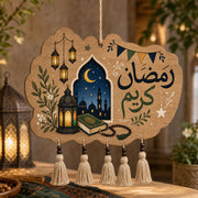 Ramadan Kareem wood hanging wall decor with Arabic calligraphy, mosque, lantern, Quran, prayer beads, and hanging tassels.