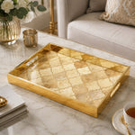 Moroccan Quatrefoil Gold Decorative Tray, 40x30cm Tempered Glass on a coffee table, featuring UV-printed artwork on tempered glass with an electroplated frame and matching handles.