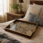 Moroccan Tile Decorative Tray with Dark Wood Frame and Gold Handles | Minti Home styled on a console table with a ceramic mug and books beside a brass lamp.