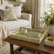 Olive Green Morris Floral Plastic Serving Tray – Vine Scrollwork styled on a coffee table with books, a candle, and decorative accessories.