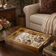 Islamic Mosque Embroidery Gold Decorative Tray with Green Domes and Gold Frame | Minti Home styled on a console table with a ceramic mug and books beside a brass lamp.