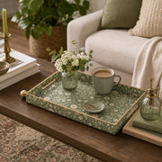 Sage Green Daisy Botanical Rectangular Tray | Table Decor styled on a coffee table with books, a candle, and decorative accessories.