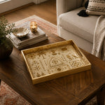 Middle East Tribal Geometric Glass Serving Tray – Camels styled on a console table with a ceramic mug and books beside a brass lamp.
