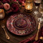 Decorative charger plate on a linen table.