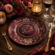 Decorative charger plate on a linen table.