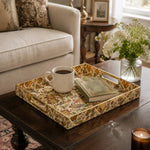 Cream Turkish Paisley Rectangular Tray | Mediterranean Home Decor styled on a coffee table with books, a candle, and decorative accessories.