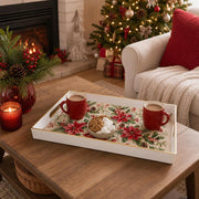 White tray with gold trim featuring red poinsettia holly and pine cone Christmas botanical pattern