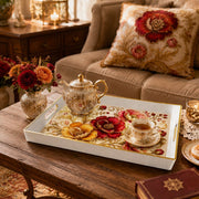 White tray with gold trim featuring embroidered-style red and yellow poppies with gold leaves