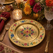 Decorative charger plate on a linen table.