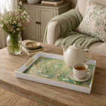 White tray with gold trim featuring watercolor wildflower meadow with pink and white botanical pattern
