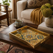 Moroccan Arch Decorative Tray with Gold Frame and Botanical Motifs | Minti Home displayed on a dining table with a porcelain teapot and fresh flowers, vintage cabinet in background.