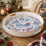 White tray with gold trim featuring blue toile Santa sleigh winter village Christmas pattern on ivory ground