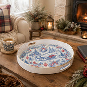 White tray with gold trim featuring blue toile Santa sleigh winter village Christmas pattern on ivory ground