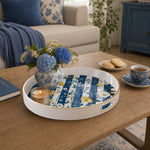 White tray with gold trim featuring blue striped botanical with yellow peony and white floral design
